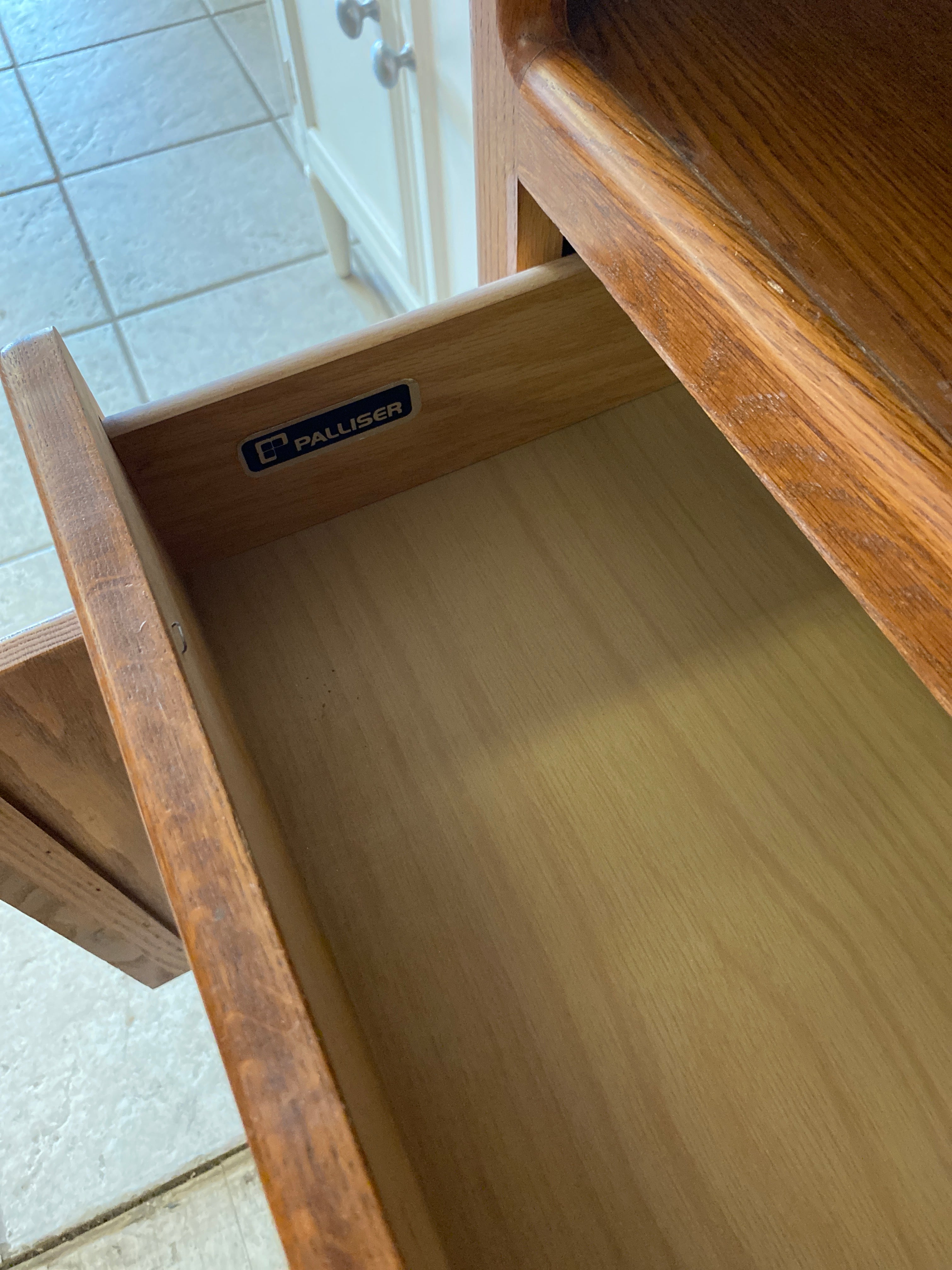 Solid oak bookcase with cabinet storage