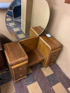 Antique vanity with round mirror