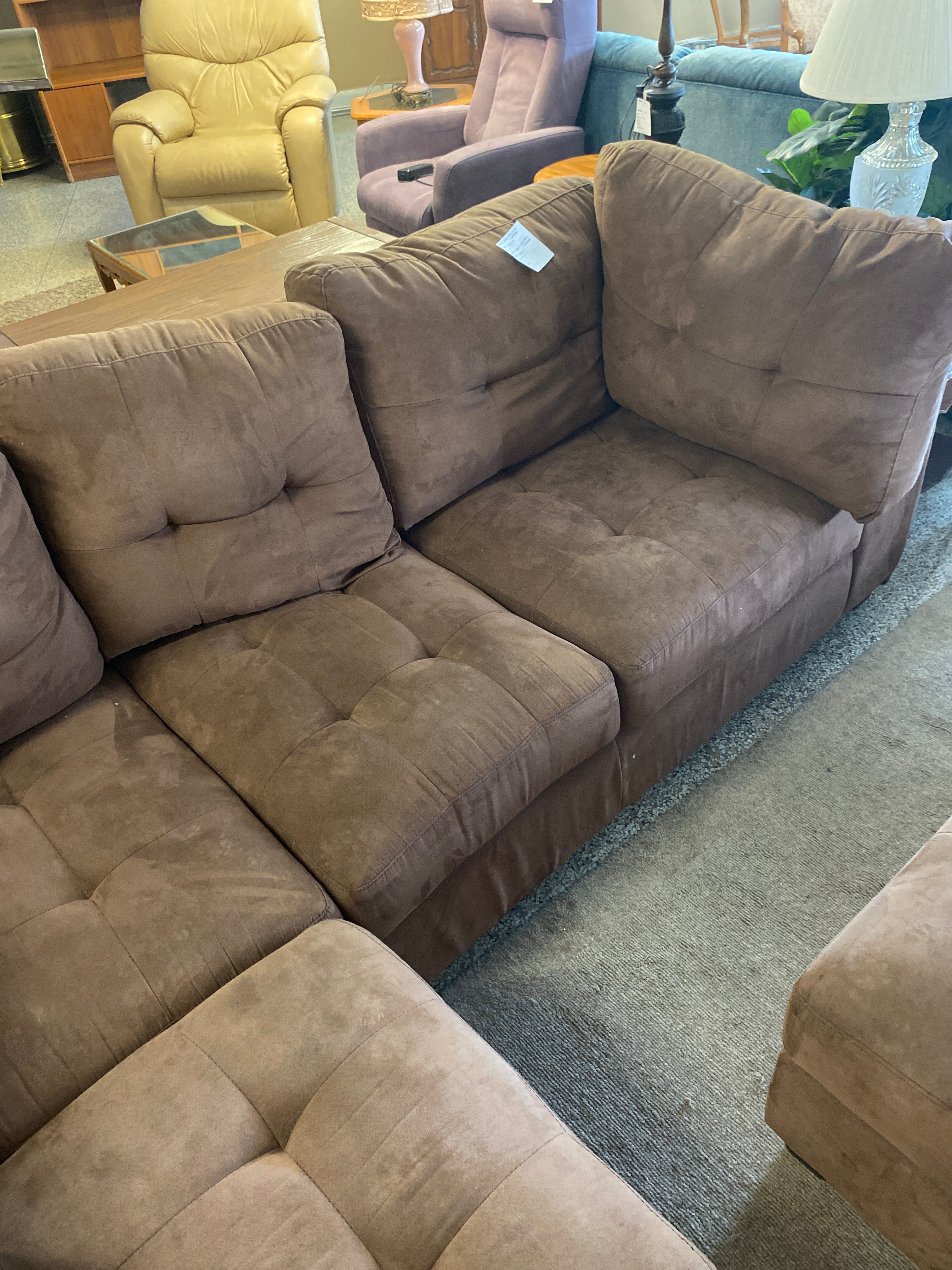 Brown sectional + ottoman