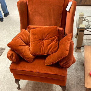 Burnt orange wingback chair