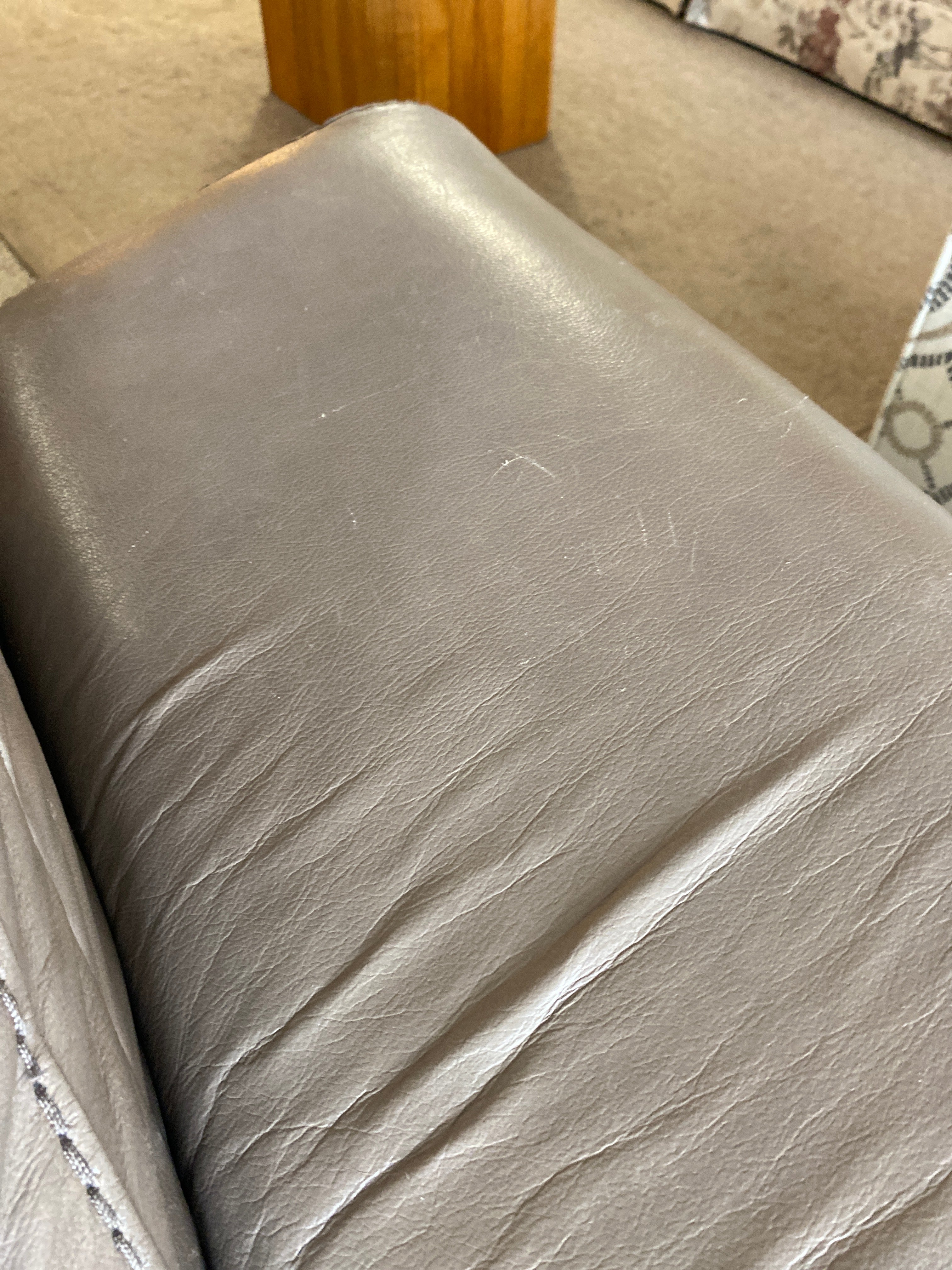 Taupe leather power reclining sofa