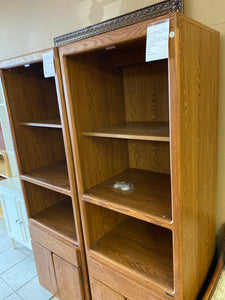 Solid oak bookcase with cabinet storage