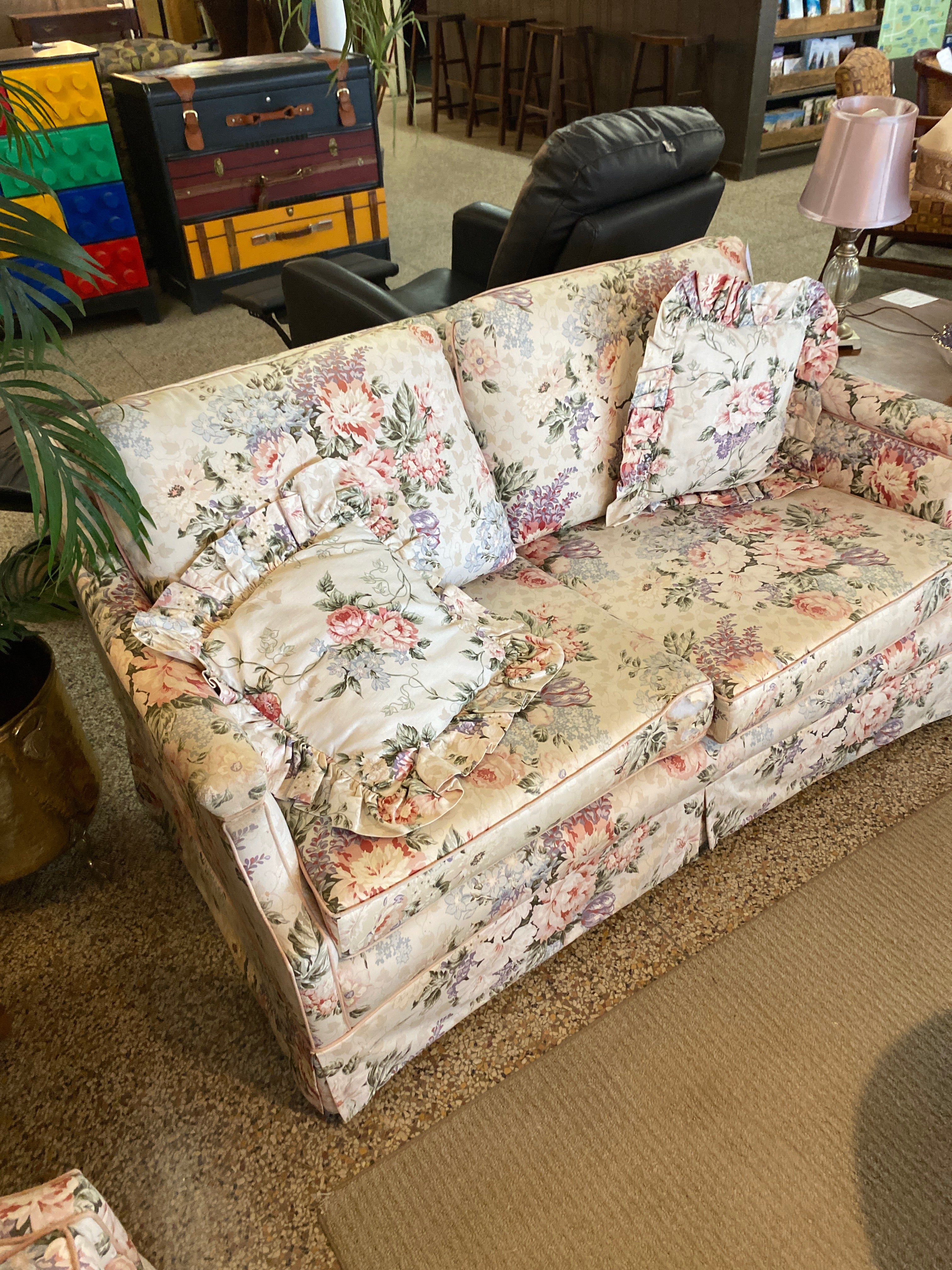 Pinkish floral loveseat