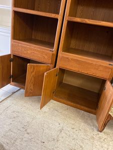 Solid oak bookcase with cabinet storage