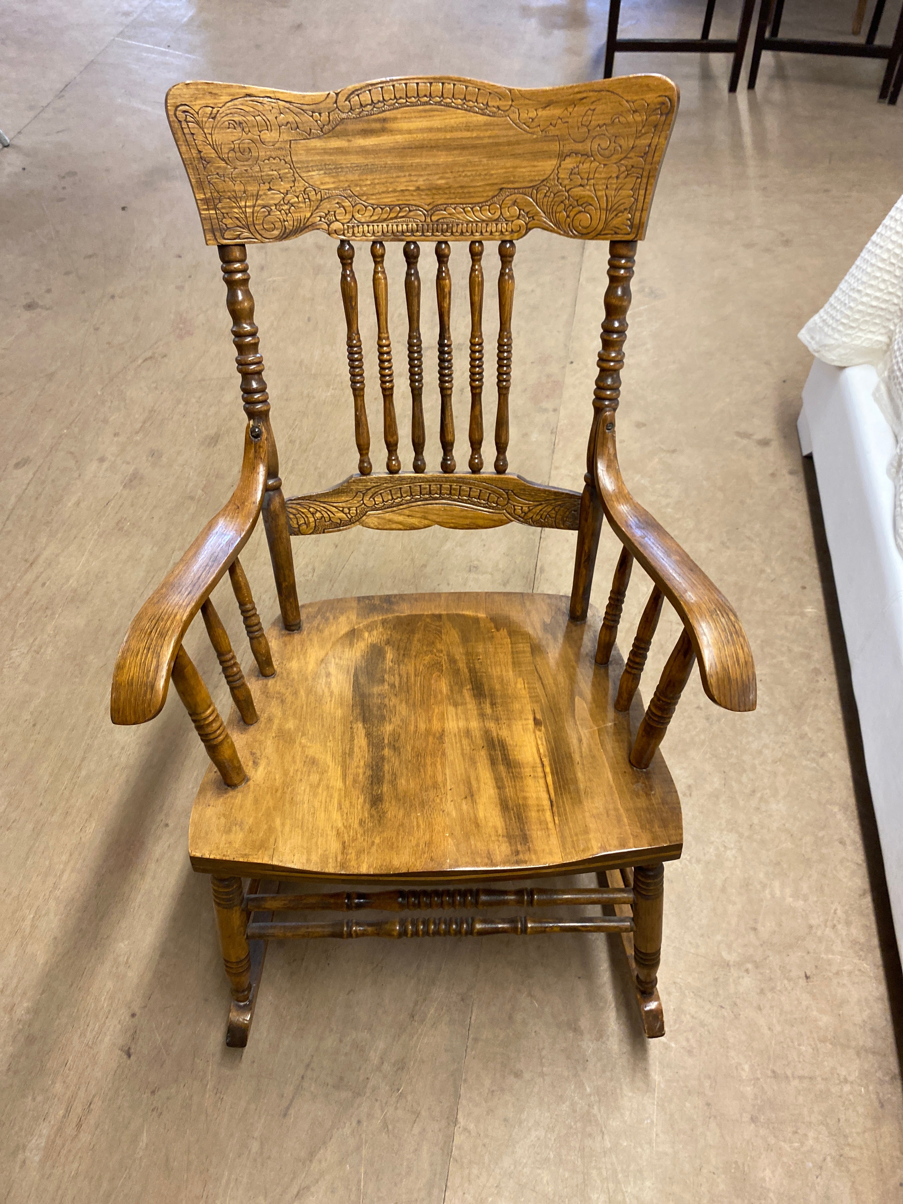 Press back rocking chair