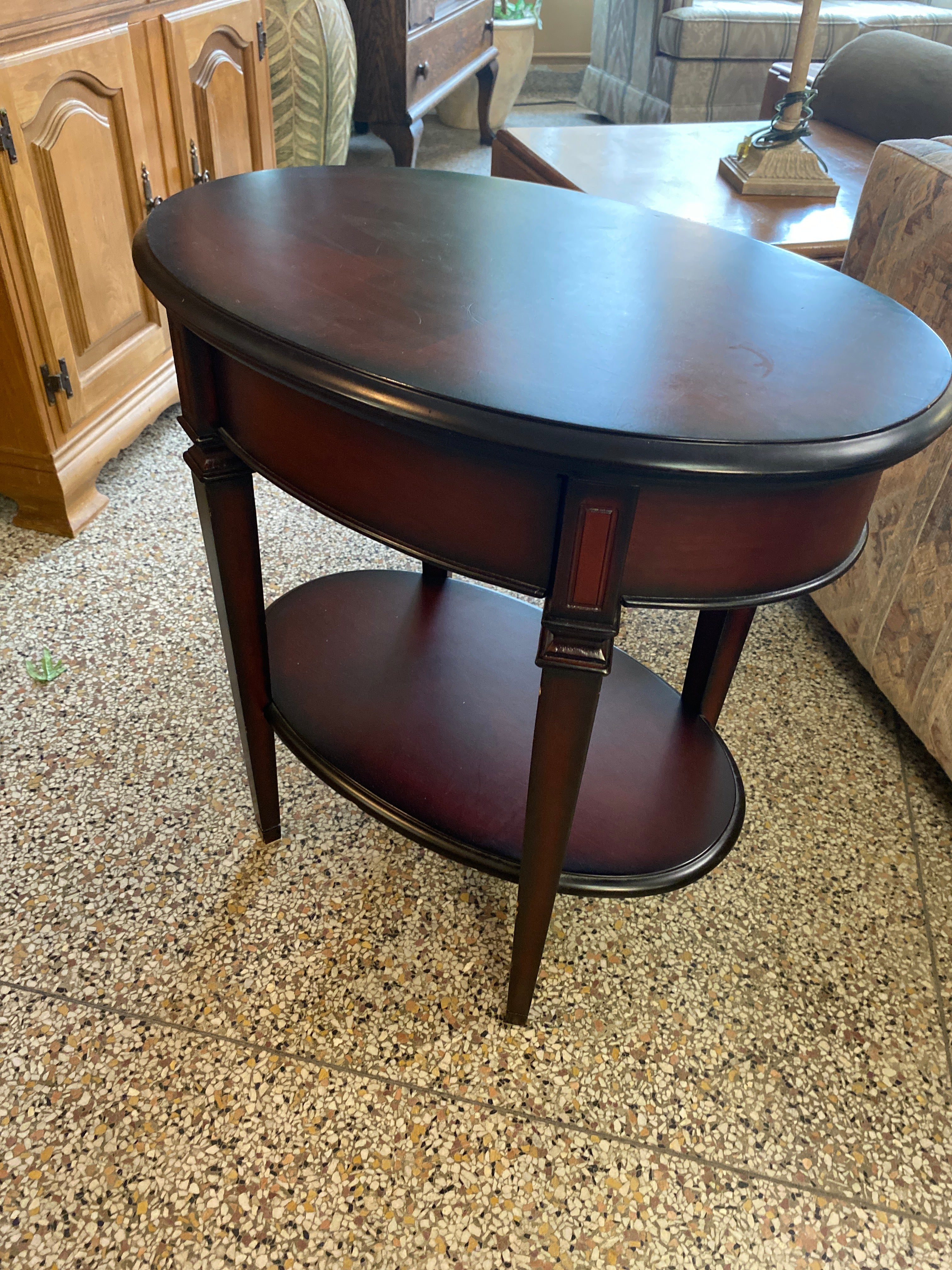 Oval dark side table