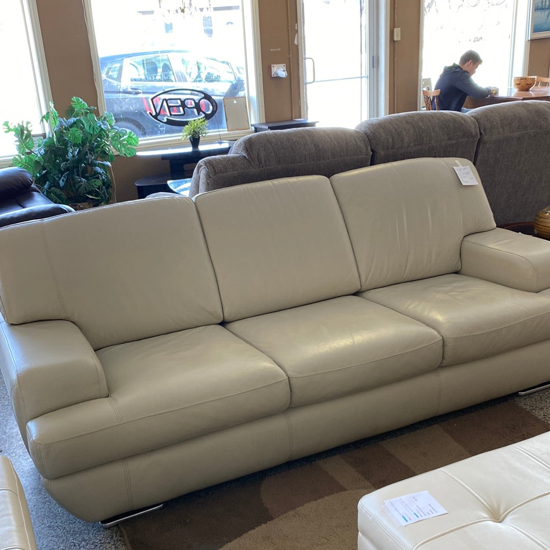 White leather chrome couch