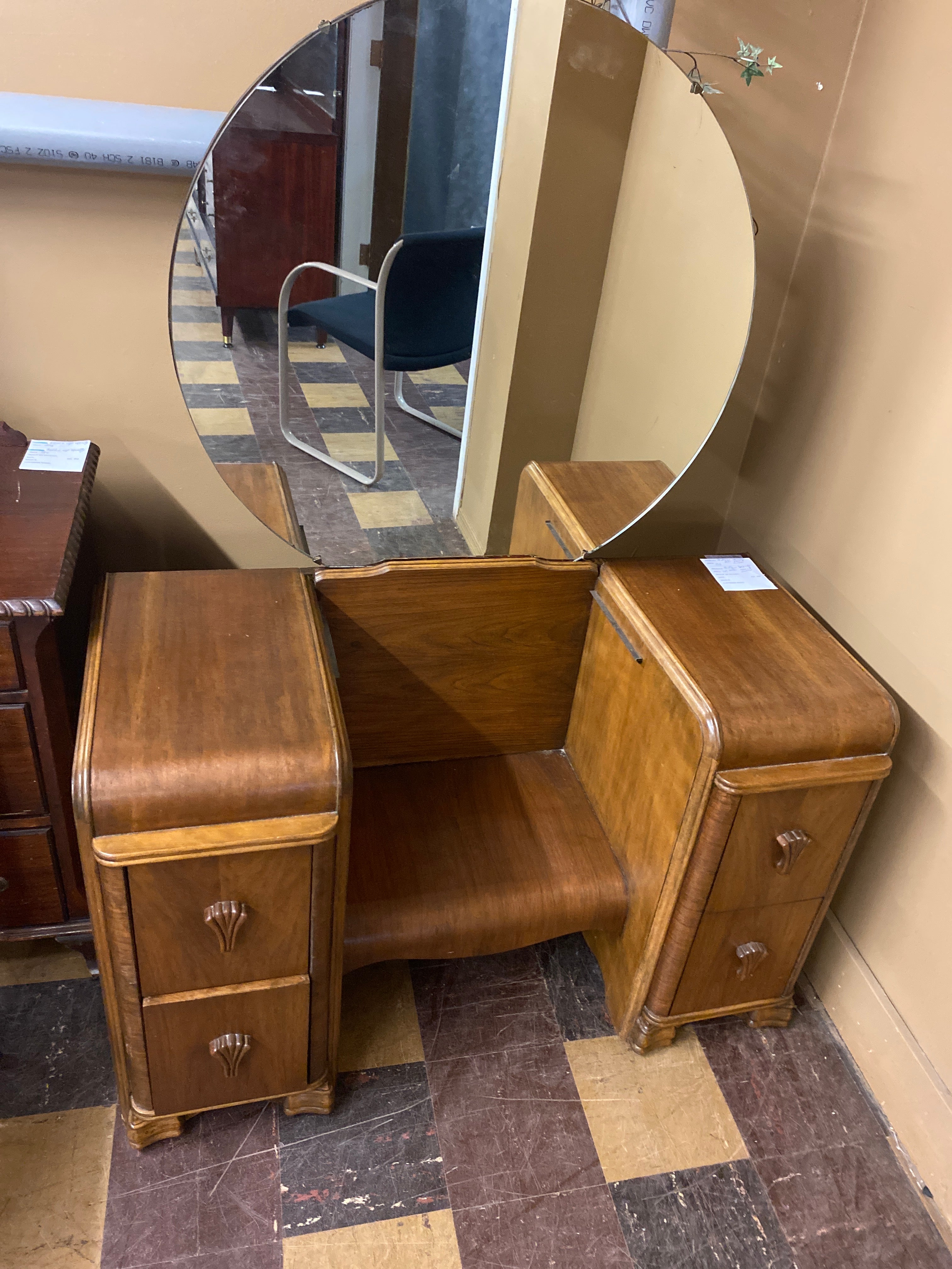 Antique vanity with round mirror