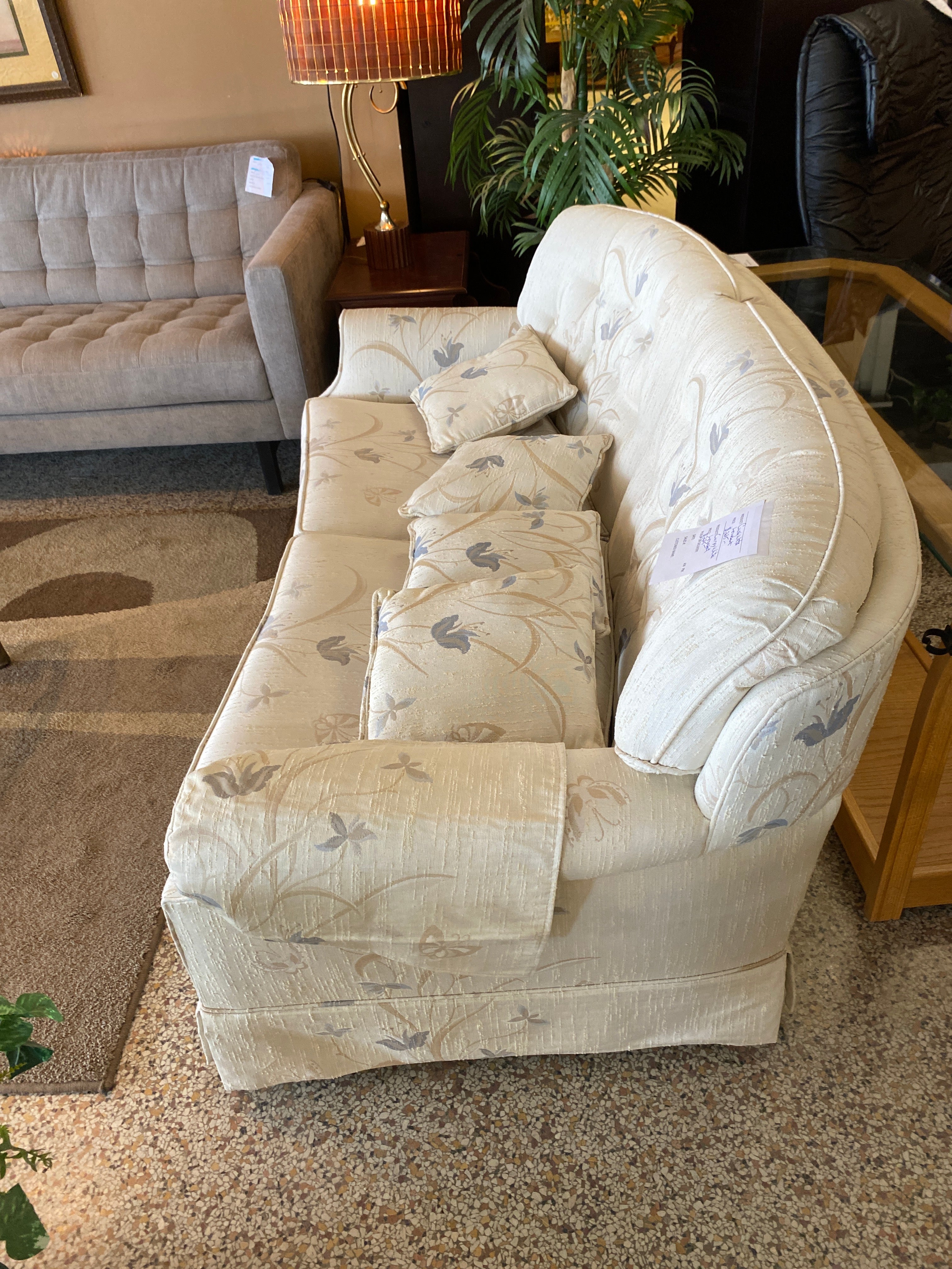 Curvy white loveseat