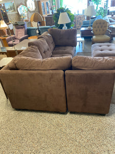 Brown sectional + ottoman