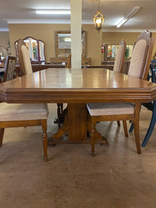 Large table with 1 leaf and 4 chairs